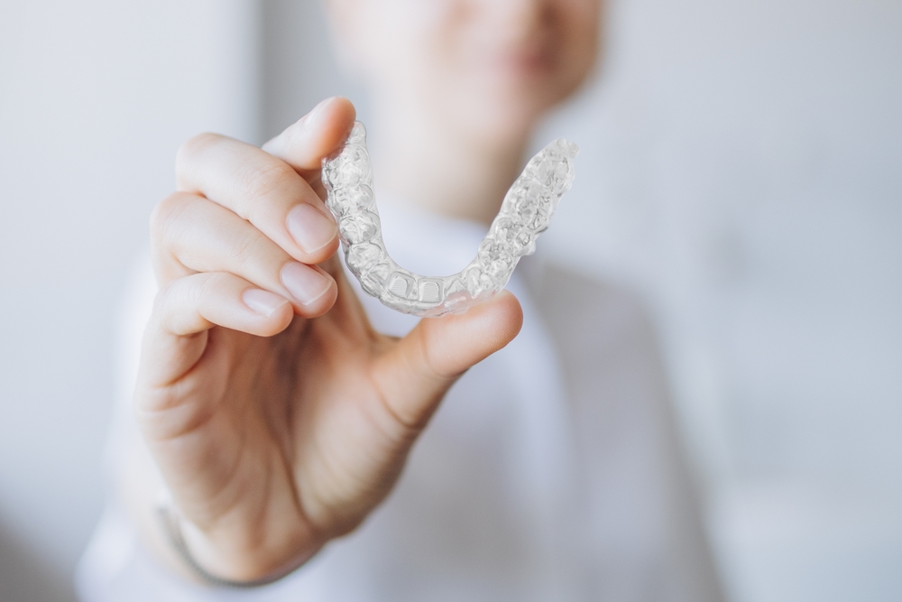 How Invisalign Improves Oral Health: The Benefits Beyond a Beautiful Smile